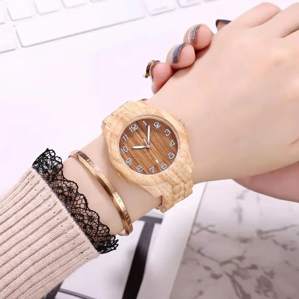 Imitacija bambusa materijal najviše se prodaju satovi ženski temperament modni satovi od umjetnog drveta smola svakodnevne jednostavne satovi Slika  0