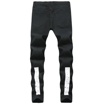 Gospodo poderane crne traperice s printevima u bijelu traku za mršavljenje elastične traper hlače ulične mode svakodnevne traperice sa rupama za muškarce.